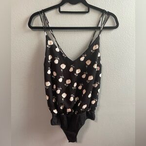 Missguided black strappy v-neck floral bodysuit. Size 4.